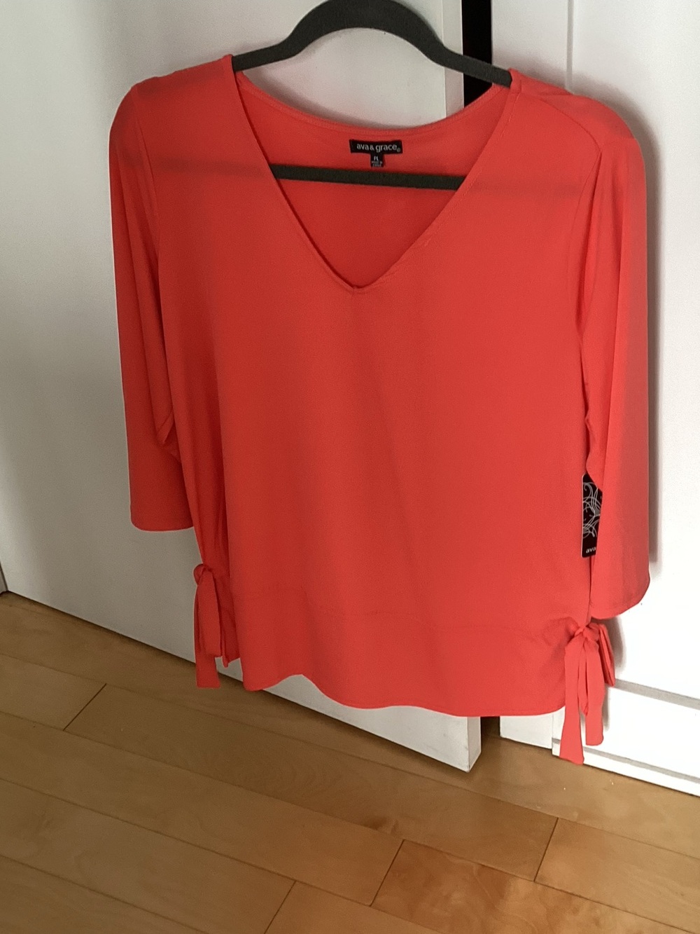 Ava & Grace Coral V-Neck Tie-Side Blouse. NWT